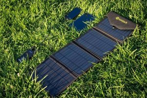 Sunjack 14W 800mAH charging in grass