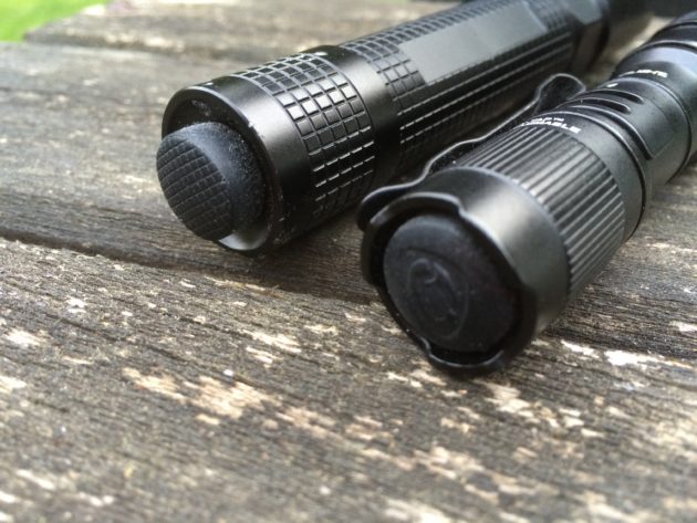 Push button tailcaps