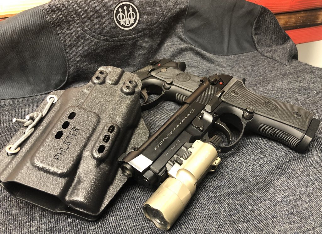 beretta 92x centurion pistol in a phlster floodlight holster iwb