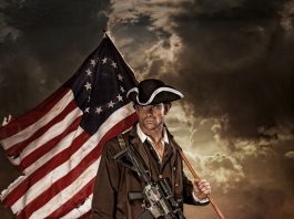 A colonial era soldier holding a modern AR15 rifle