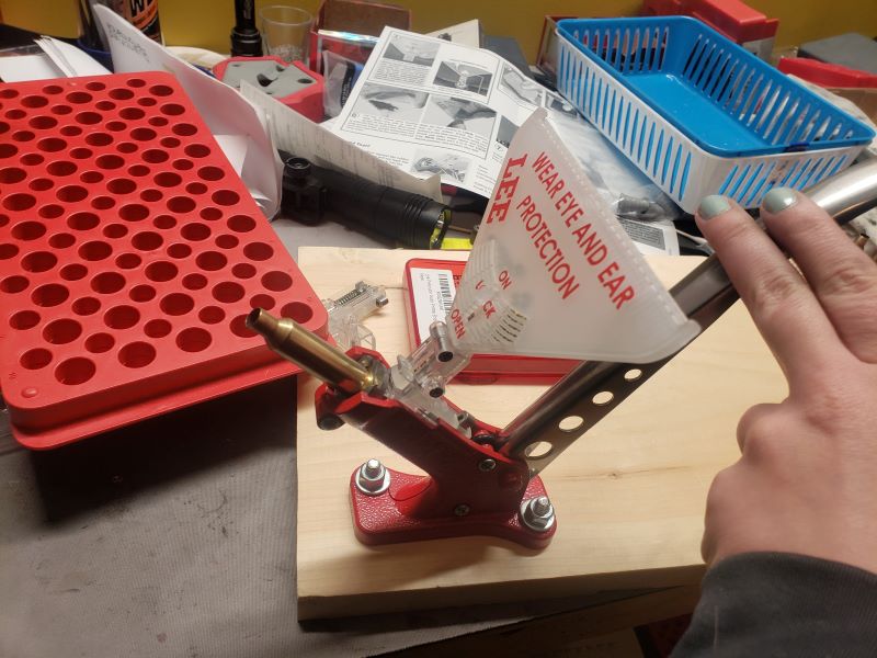 pressing on the lee auto bench priming tool