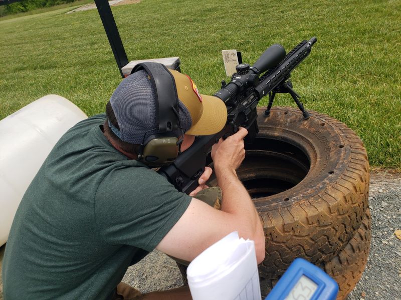 shooter shooting off of a tire