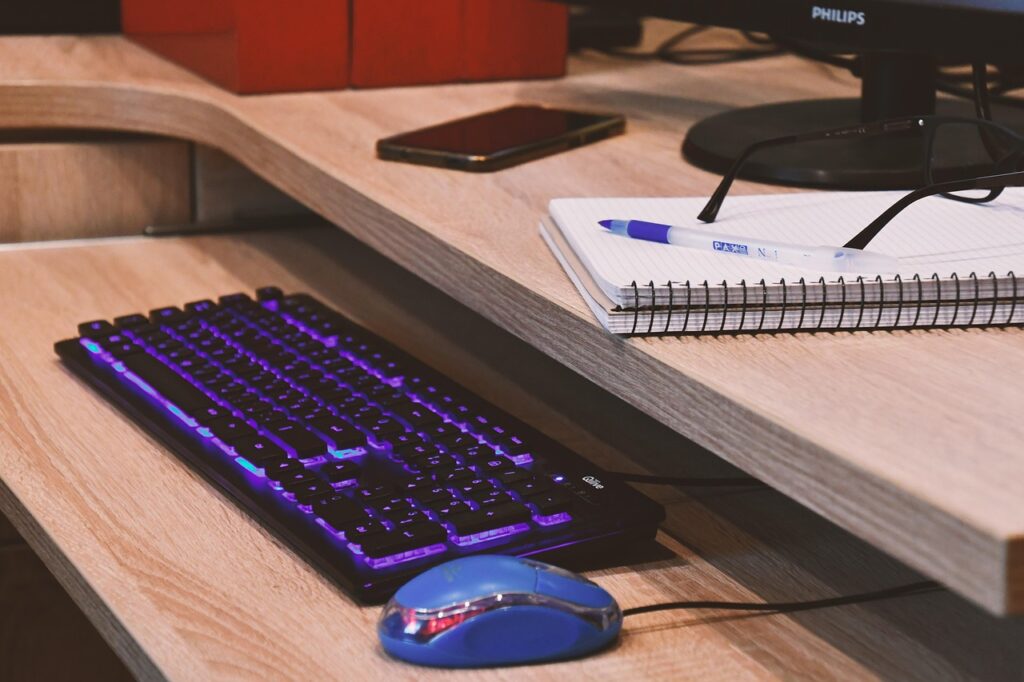 computer and keyboard used for inventory