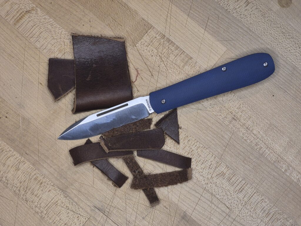 Boker Coffin - leather scraps