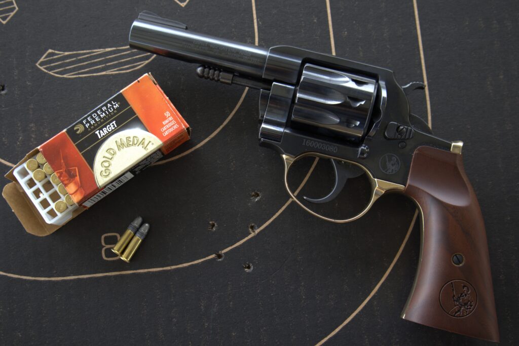 henry golden boy revolver accuracy test with a cardboard target and a box of ammunition