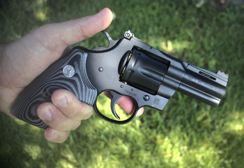 colt matte blue python left side in hand