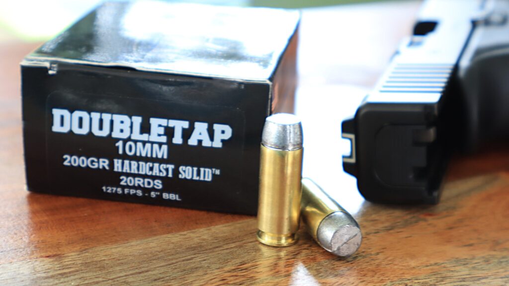 double tap 10mm solid ammunition with box and glock 20 pistol